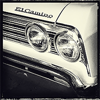 detailed front end with two headlights of a Chevy El Camino.